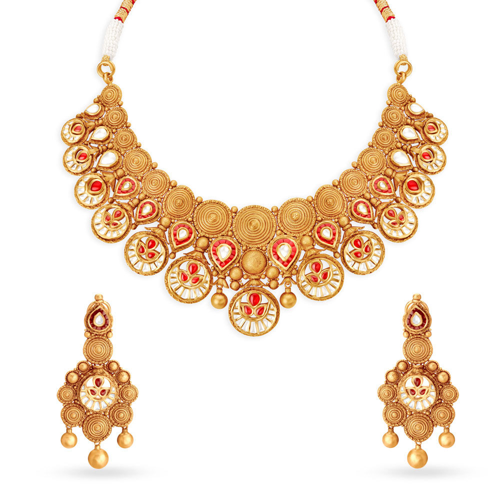 Antique gold sale jewellery tanishq