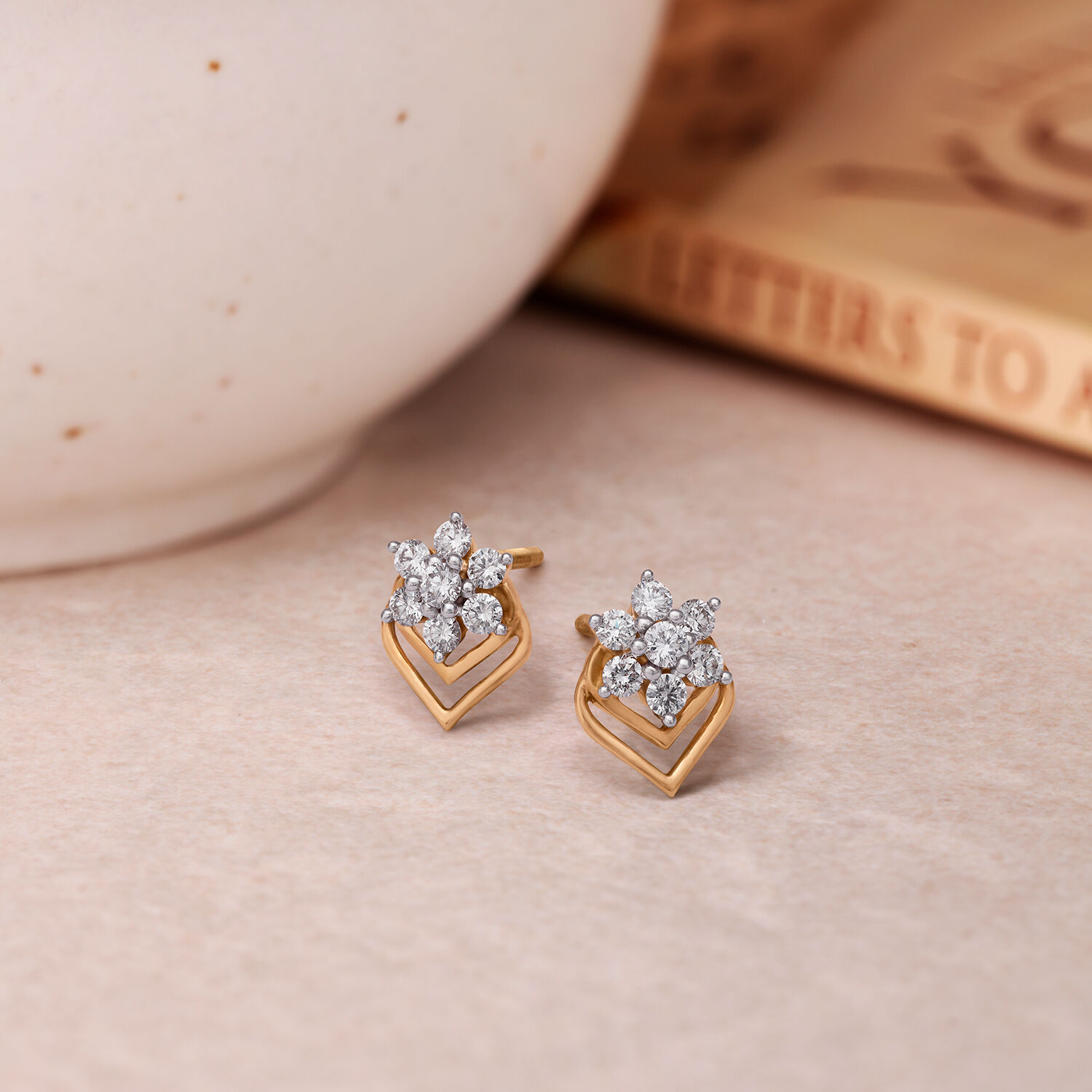 Solitaire earrings sale in tanishq