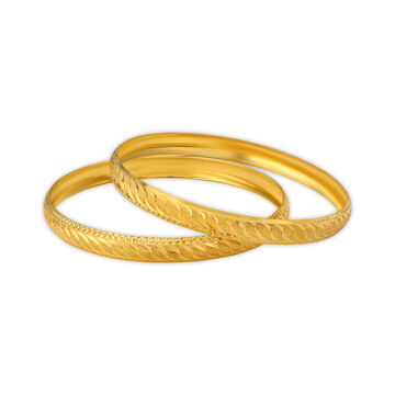 Arresting Yellow Gold Etched Bangles