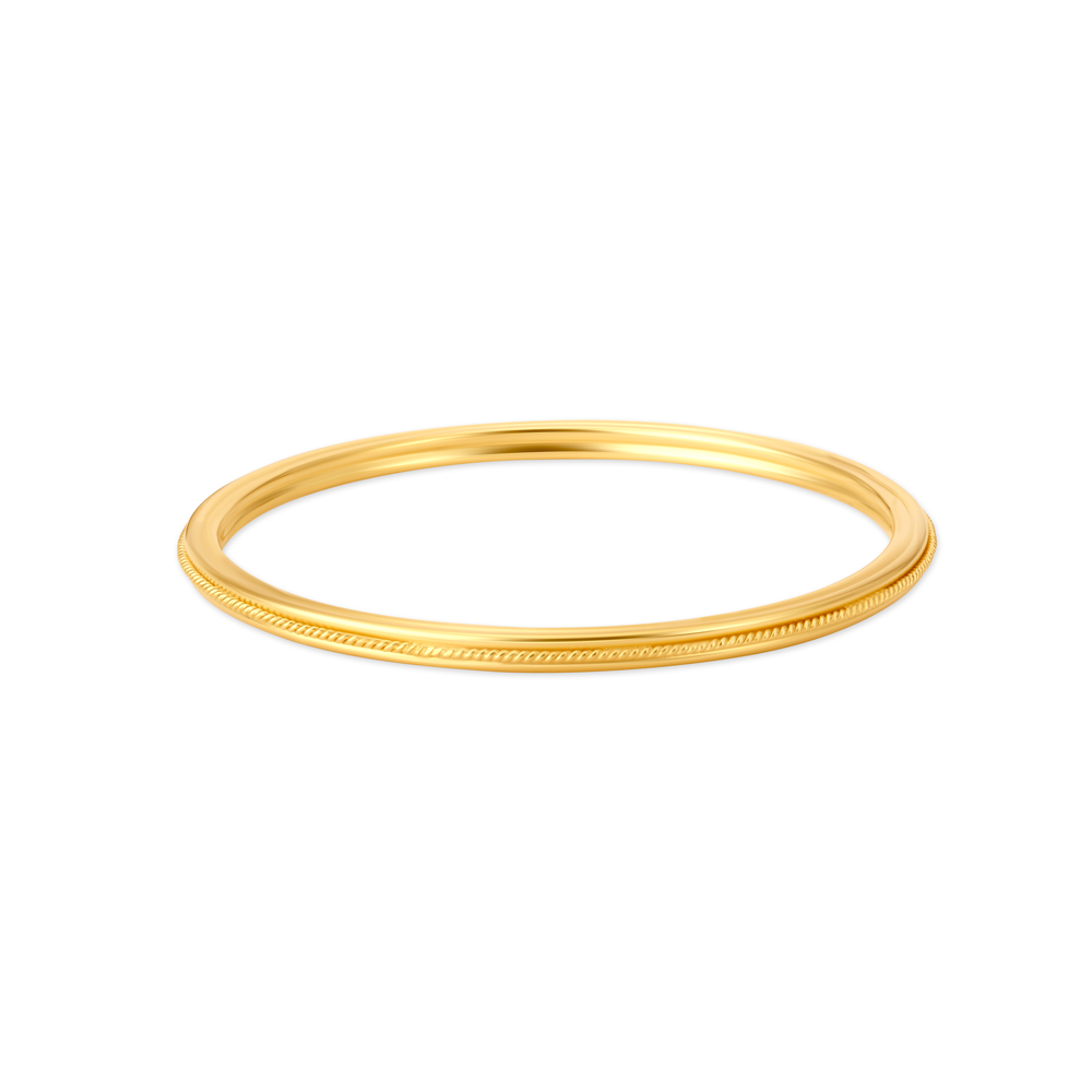 

Carved Glossy Gold Bangle