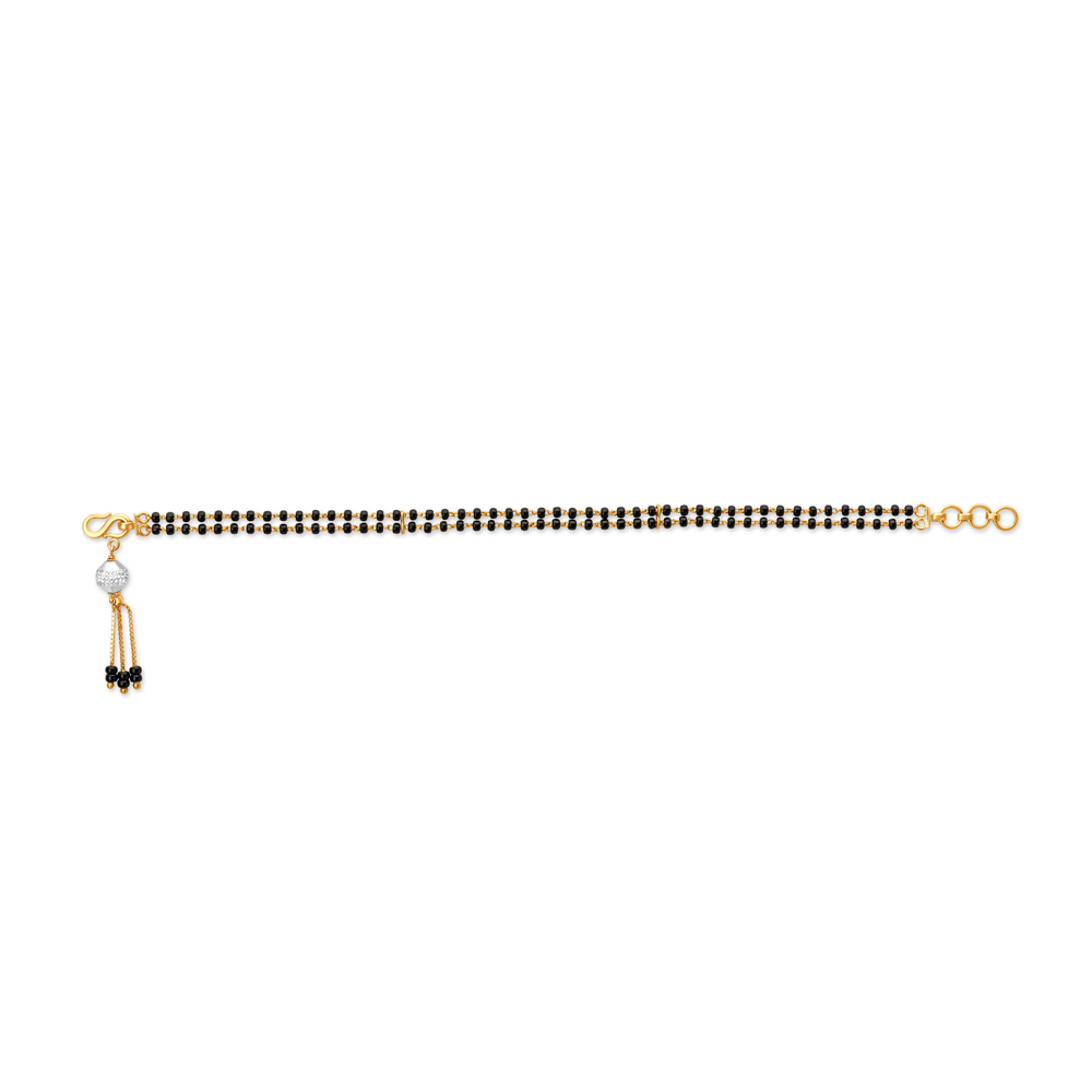 Gold mangalsutra sale bracelet tanishq