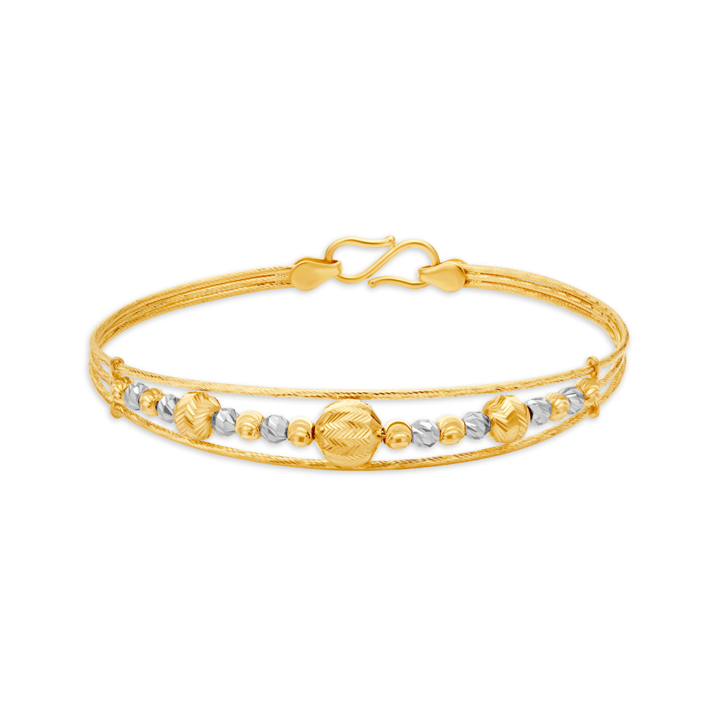 

Eclectic Gold Bangle