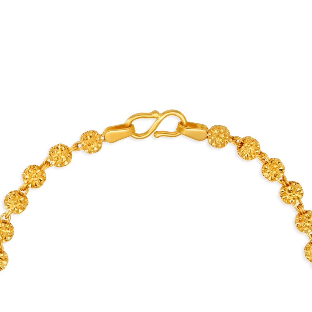 

Charming Beady Gold Bracelet