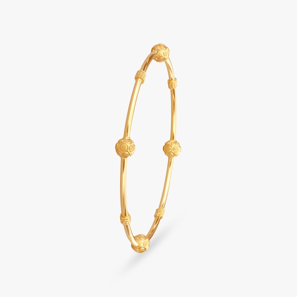 

Knurling Sphere Gold Bangle