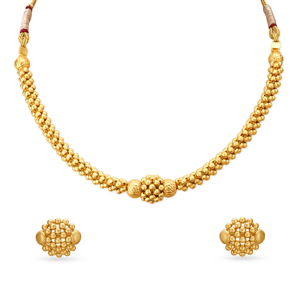 

Striking Yellow Gold Beaded Necklace and Earrings Set