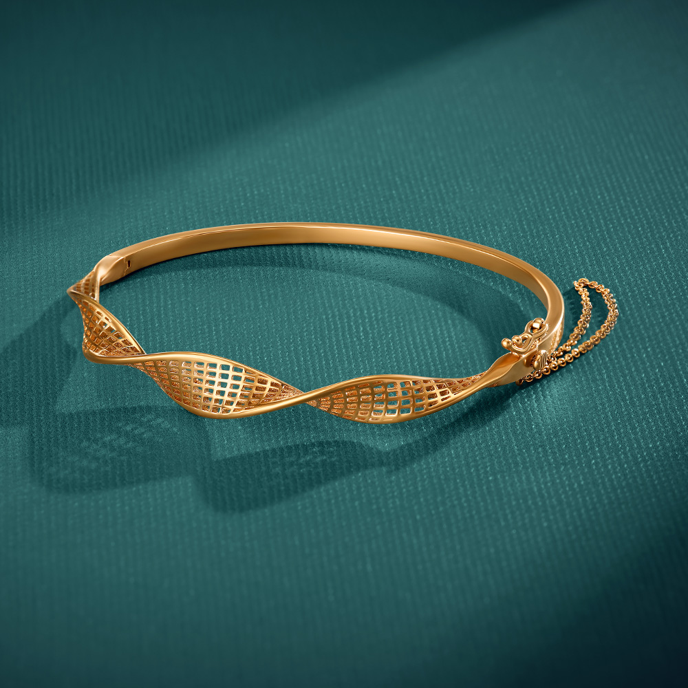 

Woven Glow Gold Bangle