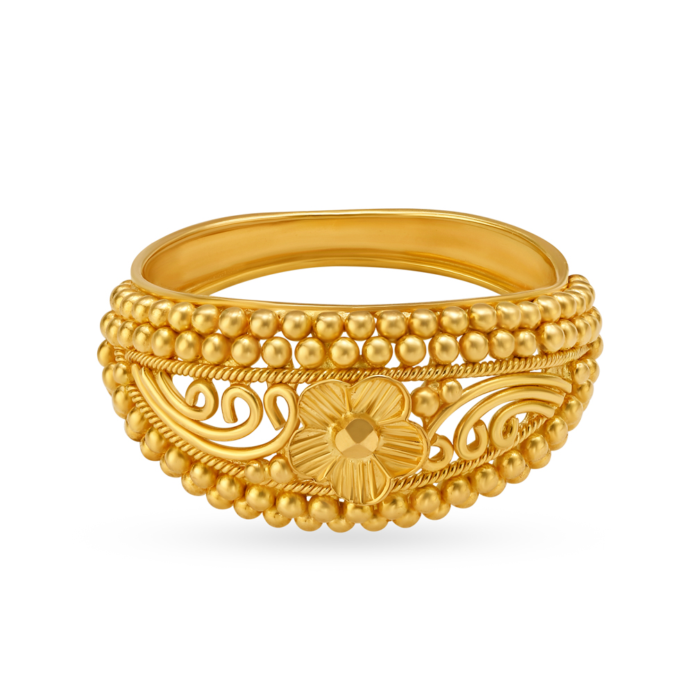 

Exquisite Floral Gold Finger Ring with Rava Work