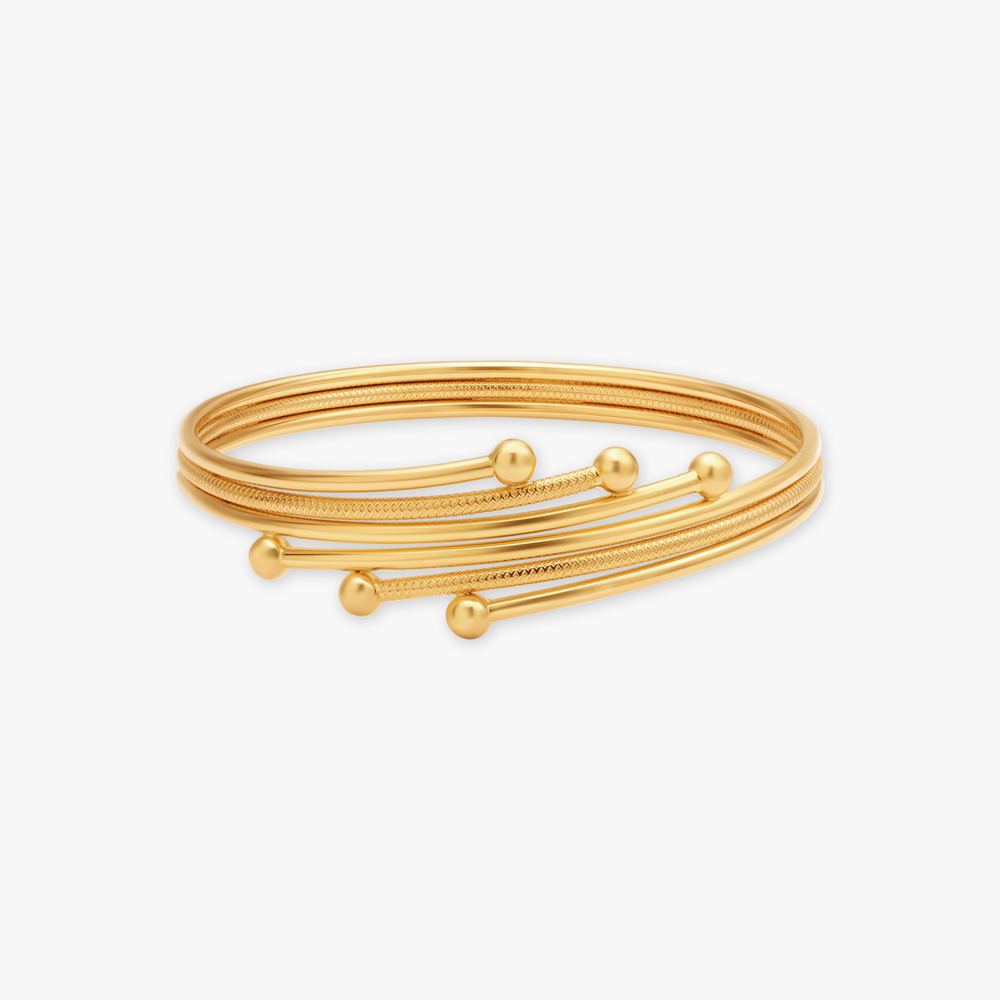 

Artistic Gold Bangle