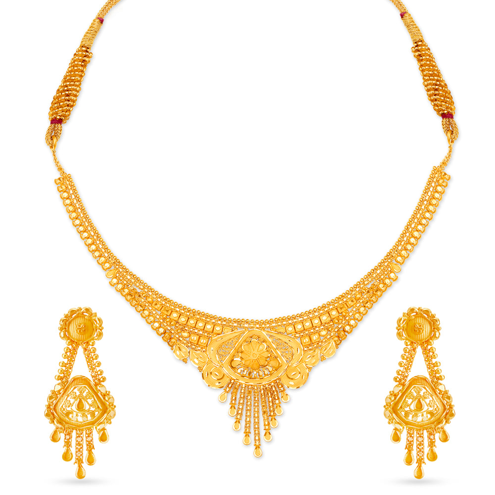 

Artistic Gold Necklace Set