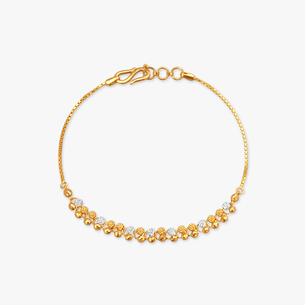 

Intricate Beaded Gold Bracelet