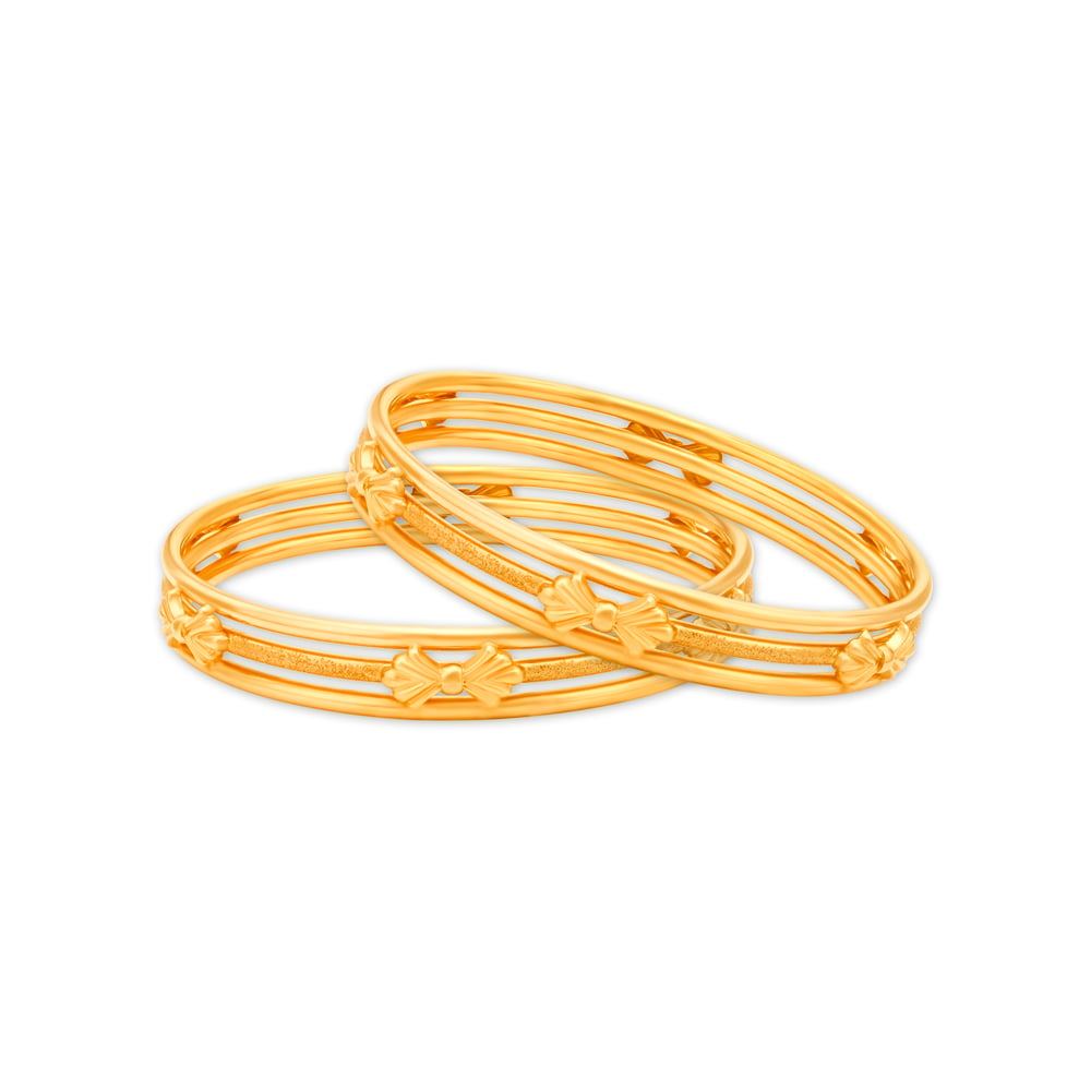 

Artistic Charm Gold Bangles