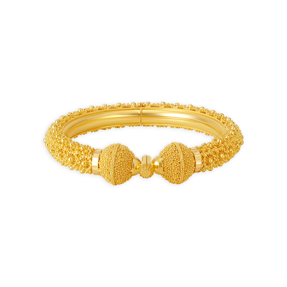 

Elaborate 22 Karat Yellow Gold Beaded Wheel Bangle