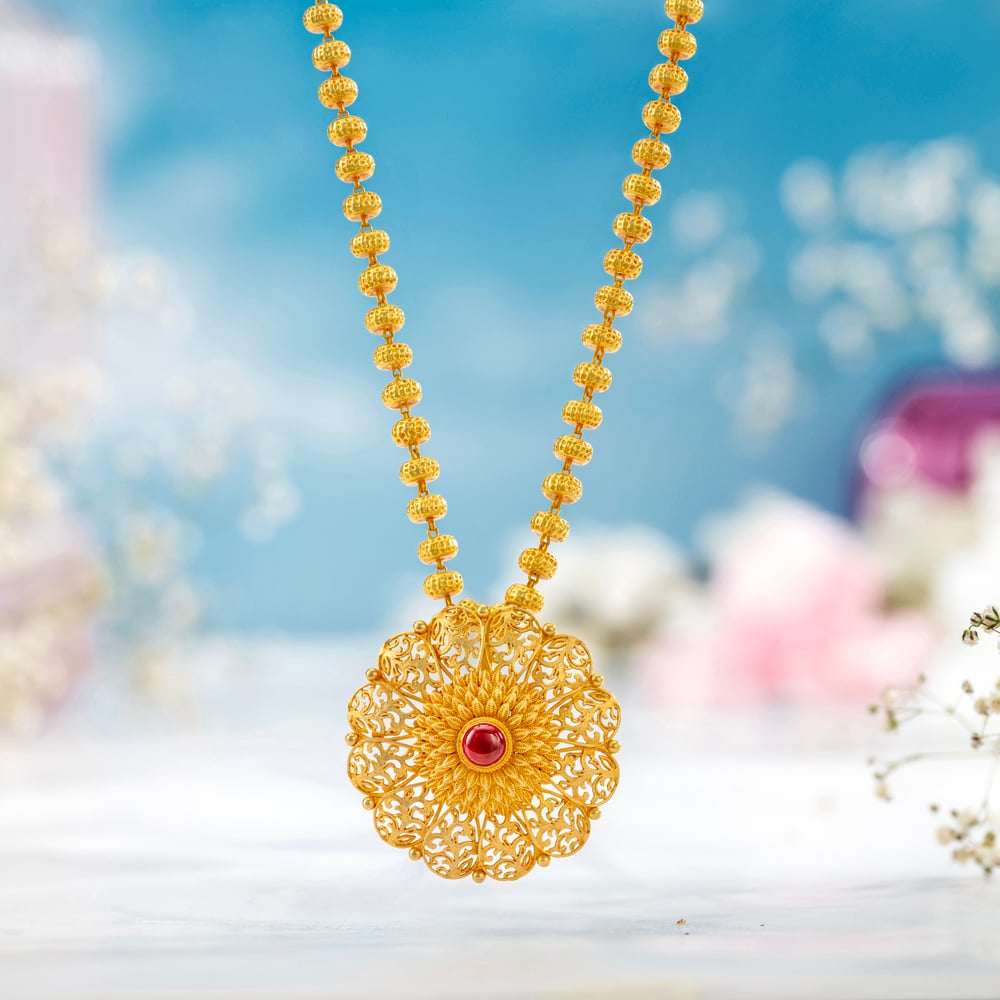 

Radiant Gold Pendant with Chain