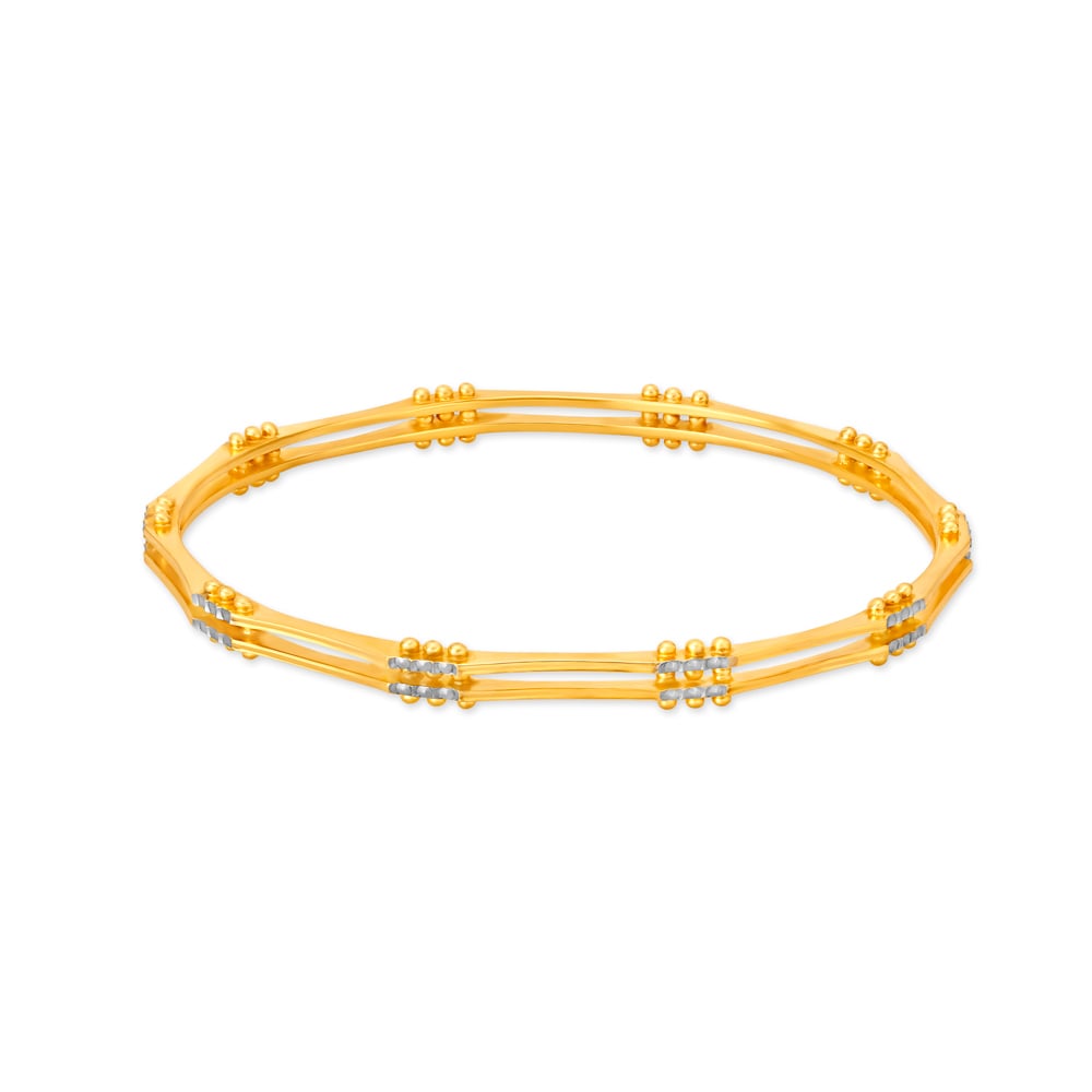 

Distinctive Yellow Gold Beaded Ribbed Bangles