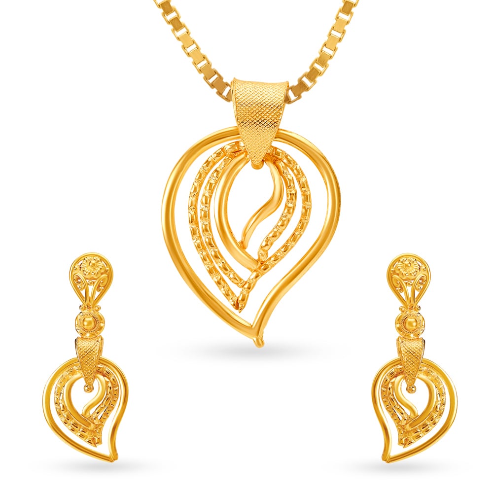 Tanishq gold pendant store set with earrings