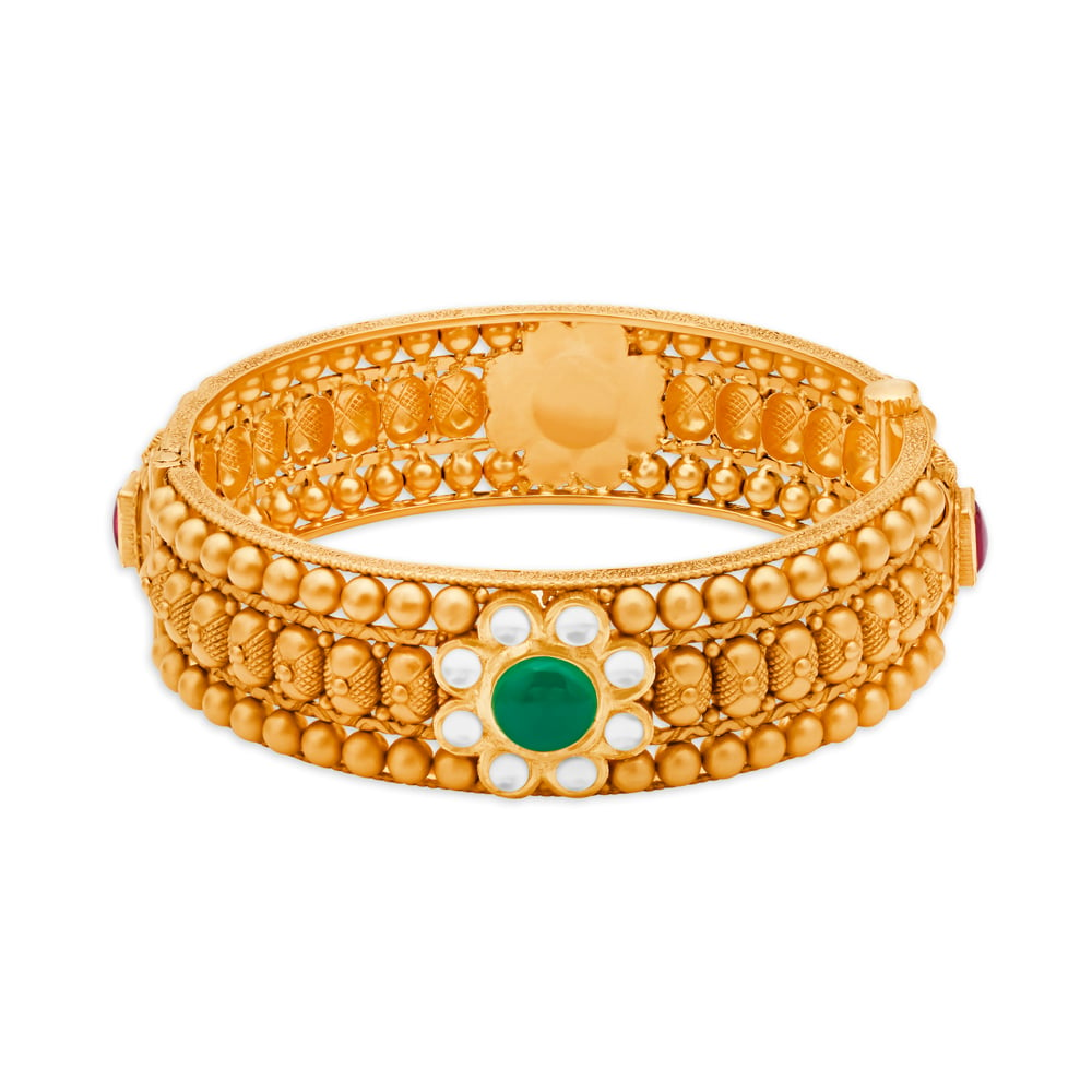 Tanishq traditional shop gold bangles