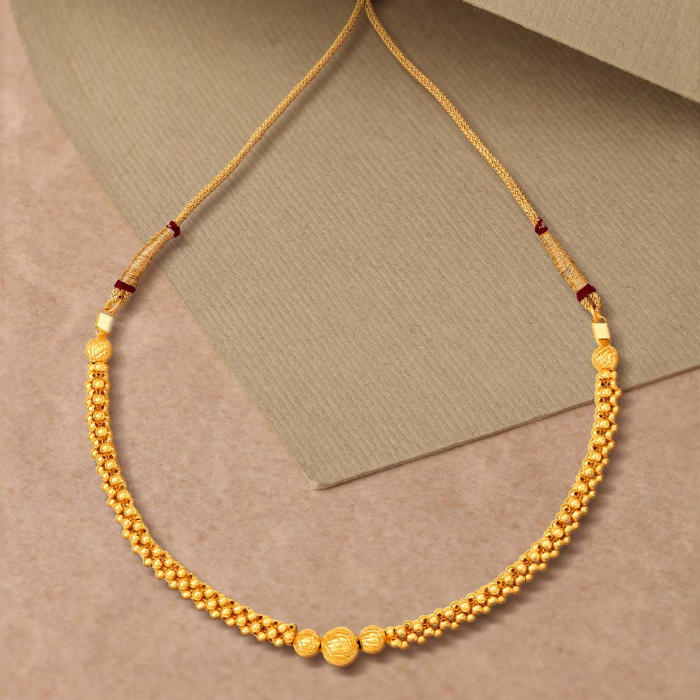 

Regal Beaded Gold Necklace