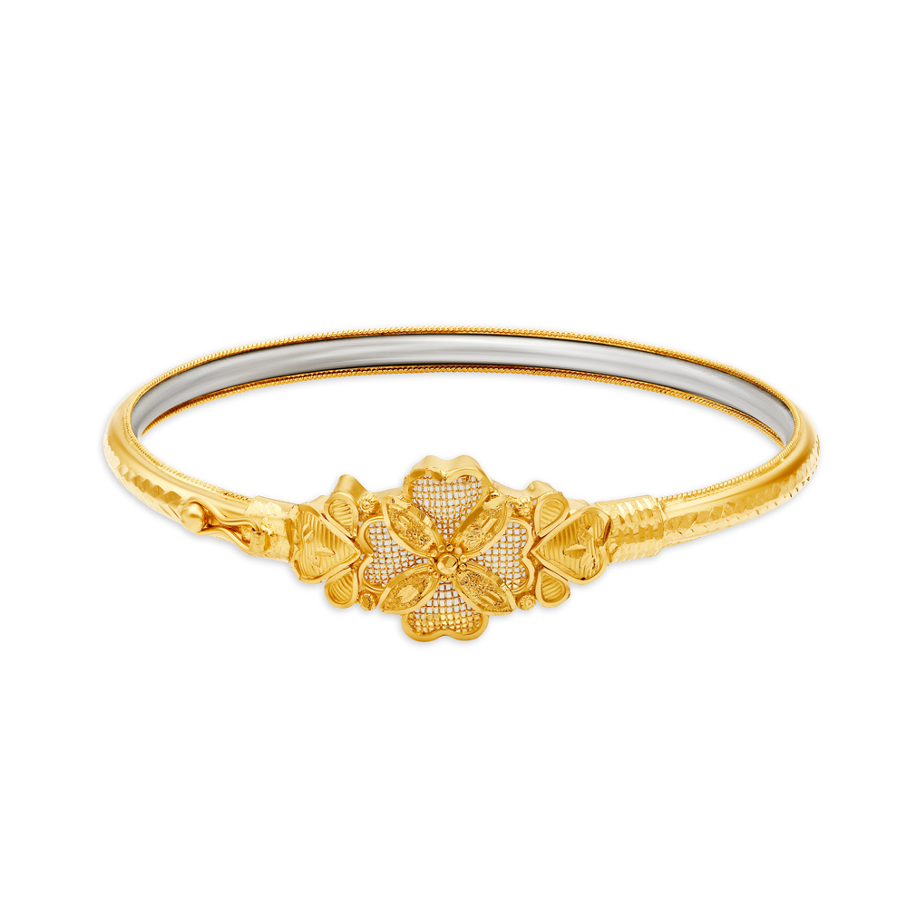 Exquisite Gold Bangle with a Floral Design