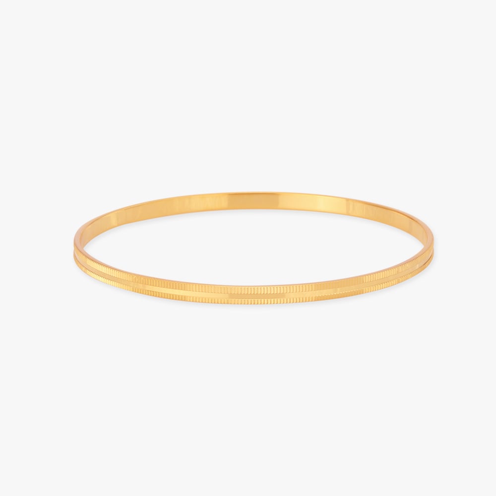 

Gleaming Horizon Gold Bangles