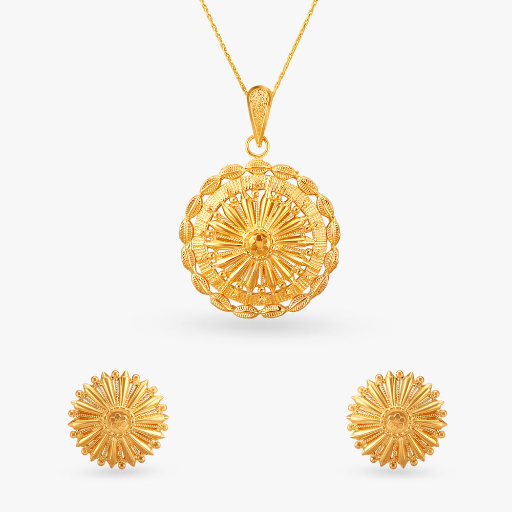 

Radiant Sunburst Gold Pendant and Earrings Set