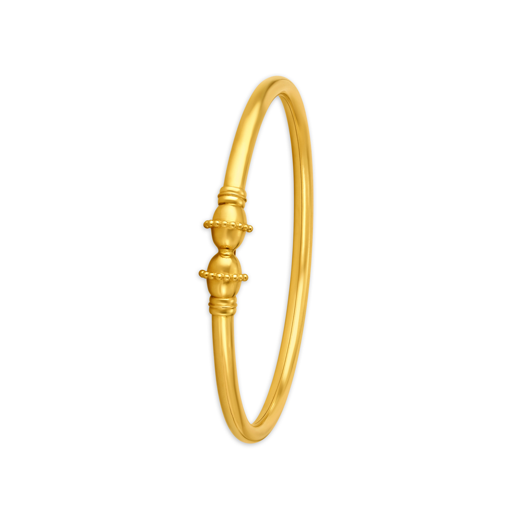 

Captivating Gold Bangle with Fancy End Pieces