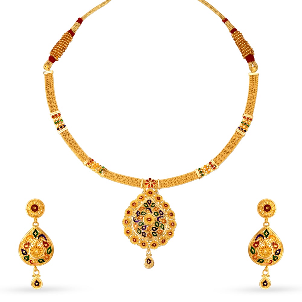 

Radiant 22 Karat Yellow Gold Floral Teardrop Necklace And Earrings Set