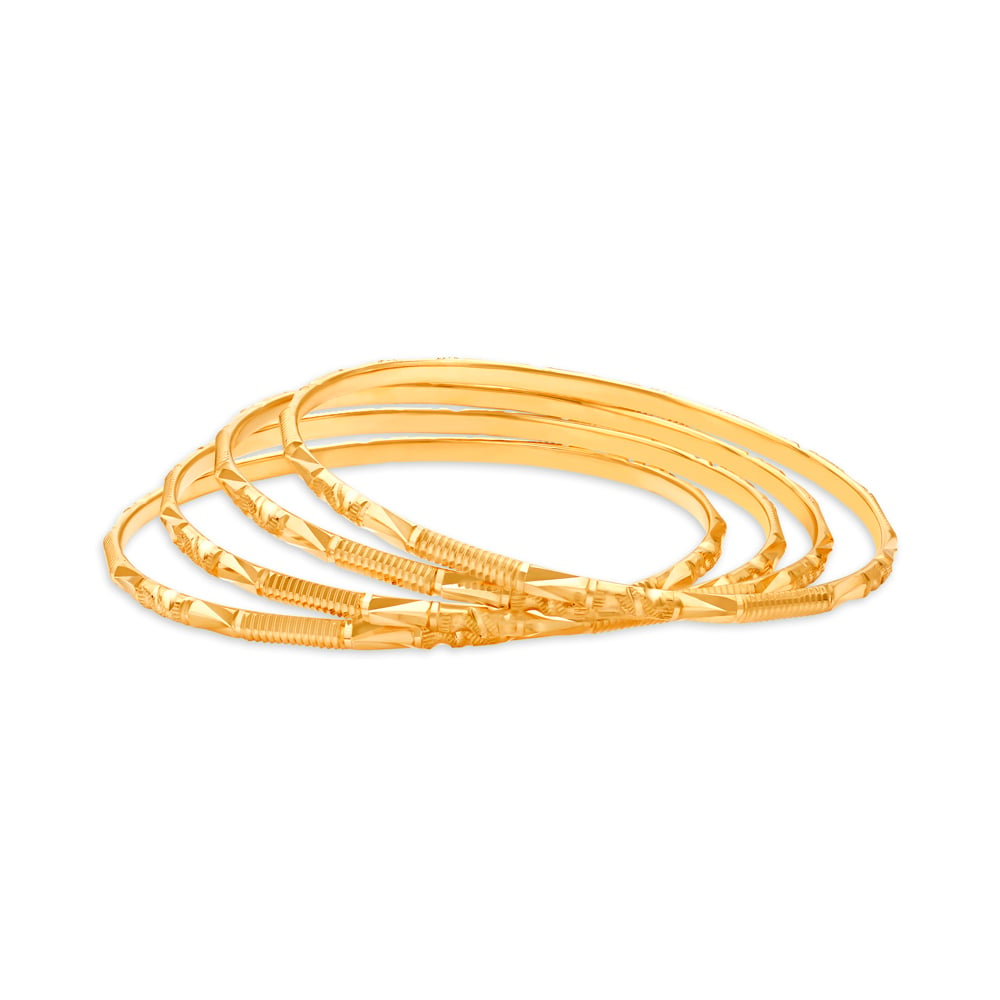 

Geometric Gold Bangles